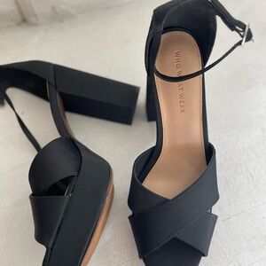Dress up your favorite outfit. 
Sexy Who What Wear Black Platform Women's Heels